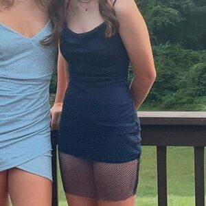 Deep blue homecoming dress
Adjustable straps